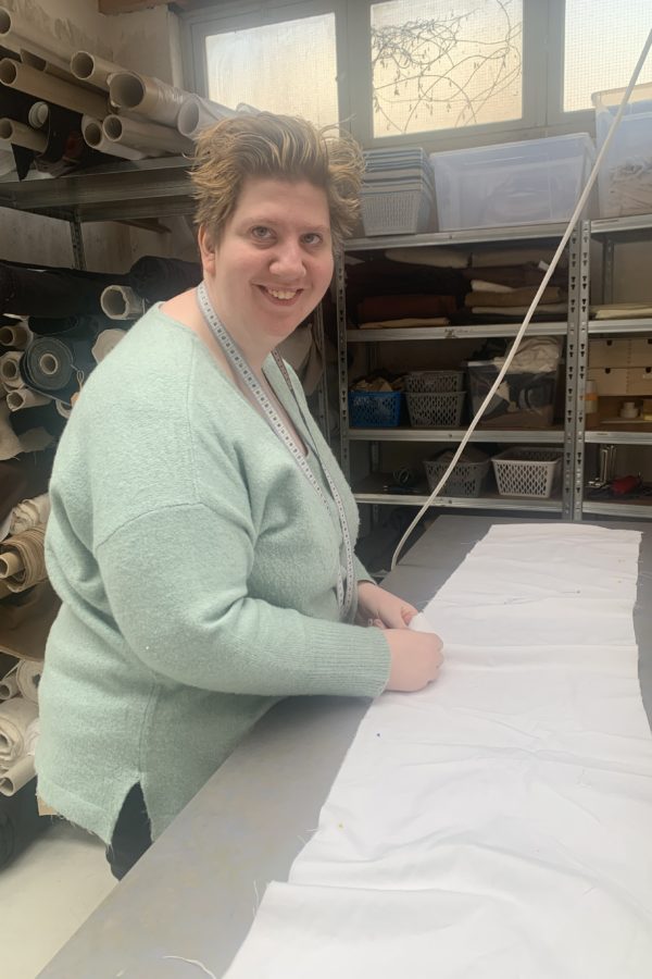 Image of Veerle working at a scarf of the Manufacturing Studio